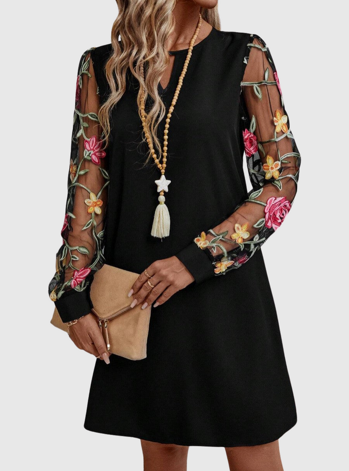 Jolanta | Elegantní šaty s výstřihem do a výraznými rukávy